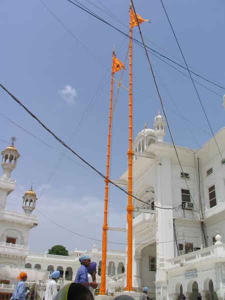 File:Nishan sahib golden temple.jpg